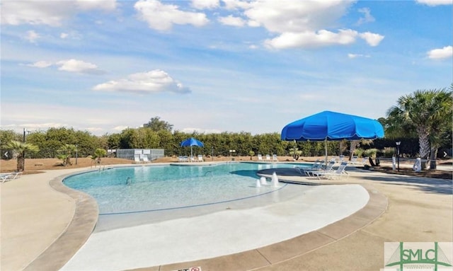 901 Garden Hills Loop, Richmond Hill, GA 31324 - community pool featuring a patio