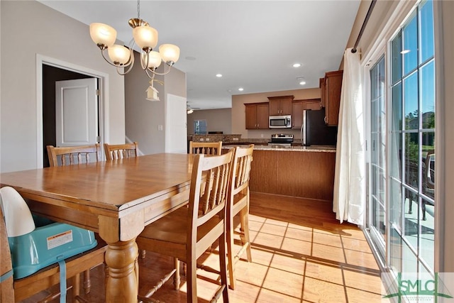 901 Garden Hills Loop, Richmond Hill, GA 31324 - dining space with plenty of natural light, a chandelier, light tile patterned floors, and recessed lighting
