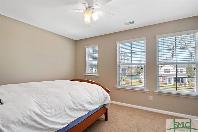 901 Garden Hills Loop, Richmond Hill, GA 31324 - carpeted bedroom featuring baseboards and a ceiling fan