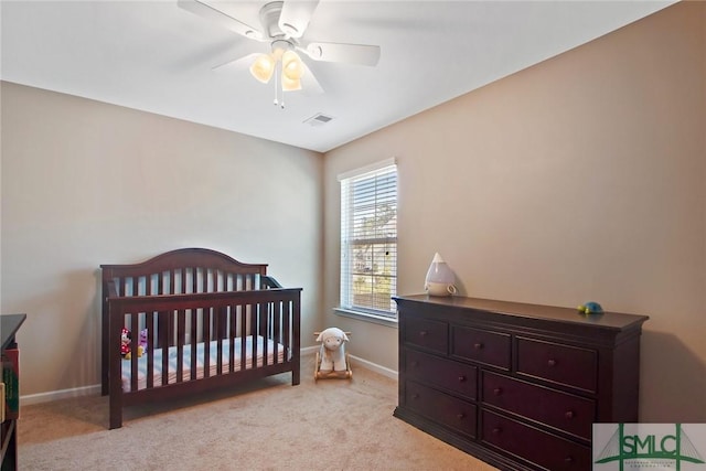 901 Garden Hills Loop, Richmond Hill, GA 31324 - bedroom with baseboards, light colored carpet, and a ceiling fan