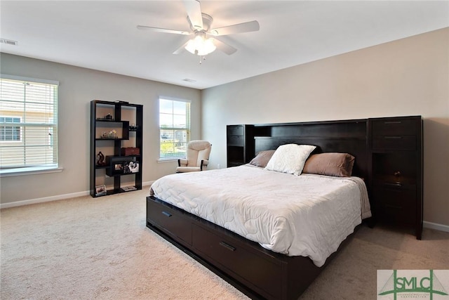 901 Garden Hills Loop, Richmond Hill, GA 31324 - bedroom featuring light carpet, baseboards, and ceiling fan