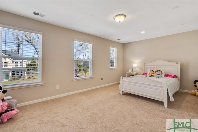 901 Garden Hills Loop, Richmond Hill, GA 31324 - bedroom with light carpet and baseboards