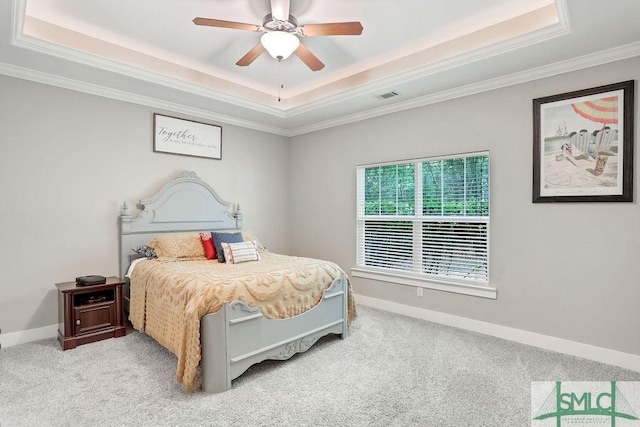 190 Blackjack Oak Dr E, Richmond Hill, GA 31324 - carpeted bedroom with a tray ceiling, ornamental molding, baseboards, and a ceiling fan