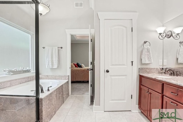 190 Blackjack Oak Dr E, Richmond Hill, GA 31324 - full bath with vanity, tile patterned flooring, a bath, and ensuite bathroom