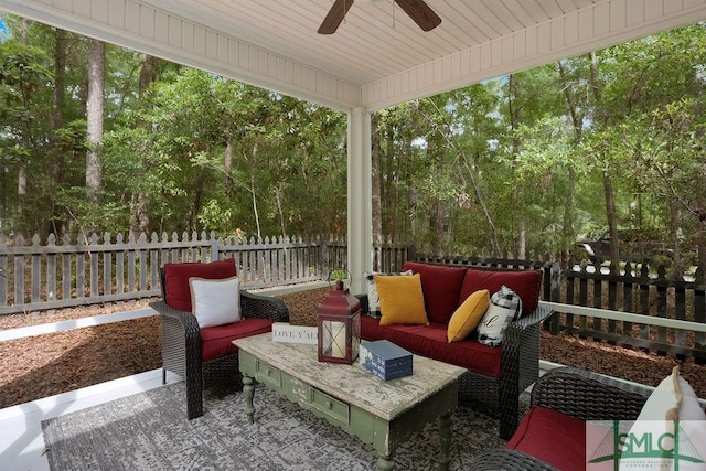 190 Blackjack Oak Dr E, Richmond Hill, GA 31324 - view of patio / terrace featuring fence, ceiling fan, outdoor lounge area, and view of scattered trees