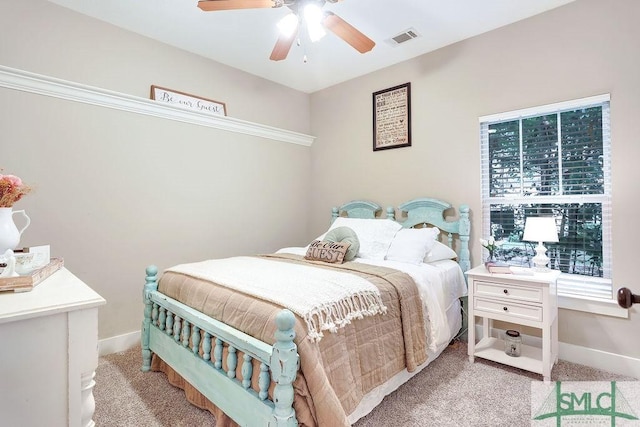 190 Blackjack Oak Dr E, Richmond Hill, GA 31324 - bedroom featuring light carpet, baseboards, and a ceiling fan