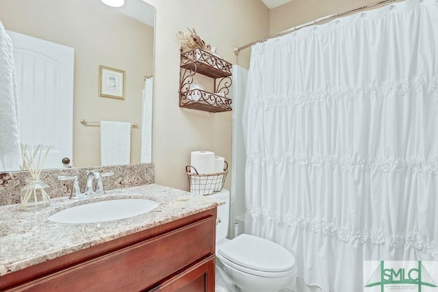 190 Blackjack Oak Dr E, Richmond Hill, GA 31324 - bathroom featuring toilet, vanity, and a shower with curtain