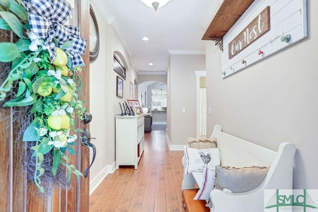 190 Blackjack Oak Dr E, Richmond Hill, GA 31324 - hallway with ornamental molding, arched walkways, light wood-type flooring, baseboards, and recessed lighting