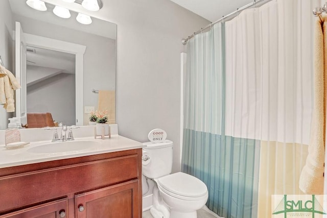 190 Blackjack Oak Dr E, Richmond Hill, GA 31324 - bathroom featuring toilet, vanity, and a shower with curtain