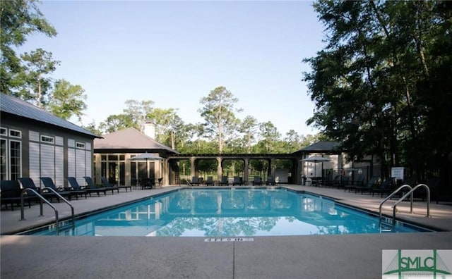 190 Blackjack Oak Dr E, Richmond Hill, GA 31324 - community pool featuring a patio