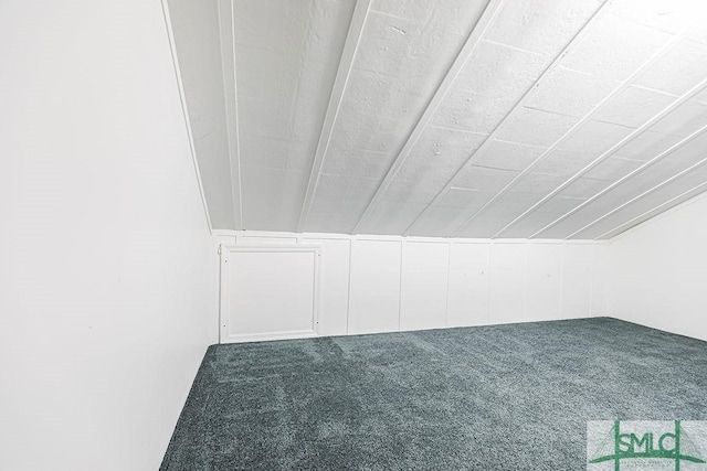 bonus room with carpet and lofted ceiling