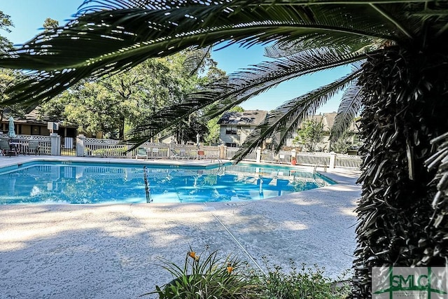 community pool with fence