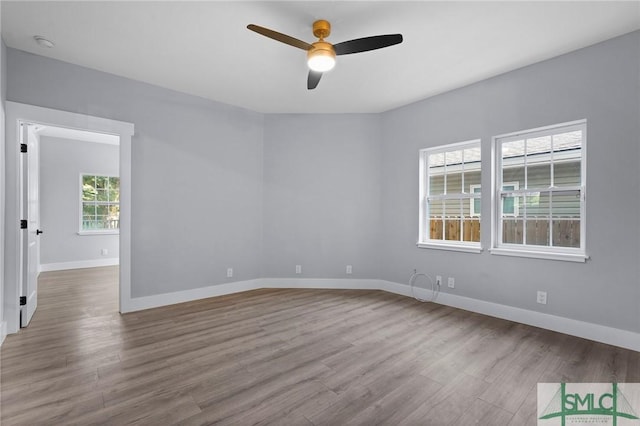 3205 Burroughs St, Savannah, GA 31405 - unfurnished room with ceiling fan, wood finished floors, and baseboards