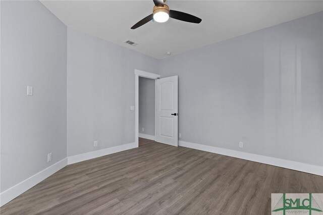 3205 Burroughs St, Savannah, GA 31405 - unfurnished room with ceiling fan, wood finished floors, and baseboards