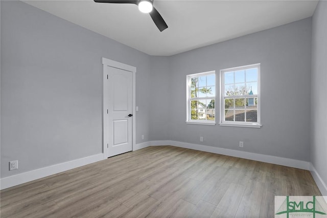 3205 Burroughs St, Savannah, GA 31405 - spare room with wood finished floors, a ceiling fan, and baseboards