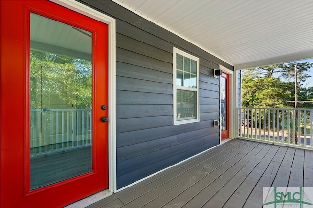 3205 Burroughs St, Savannah, GA 31405 - wooden terrace featuring a porch