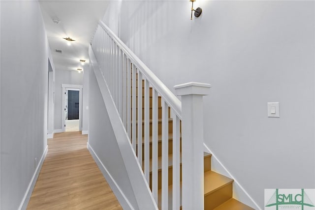 3205 Burroughs St, Savannah, GA 31405 - stairway with wood finished floors and baseboards