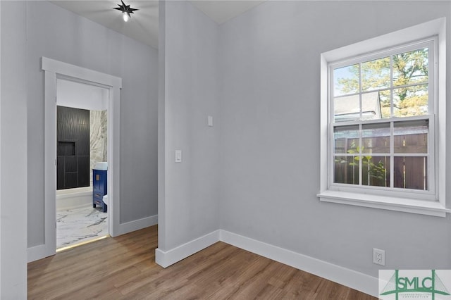 3205 Burroughs St, Savannah, GA 31405 - empty room featuring baseboards and wood finished floors