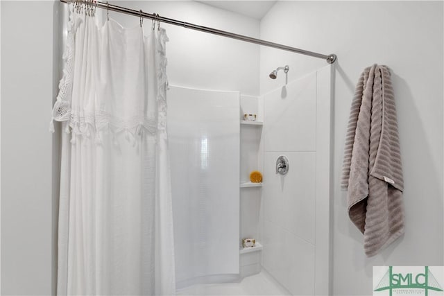 bathroom with a shower with curtain