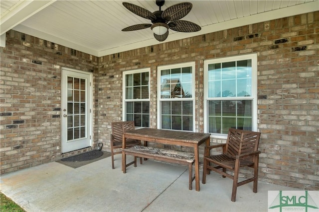 view of patio / terrace featuring ceiling fan