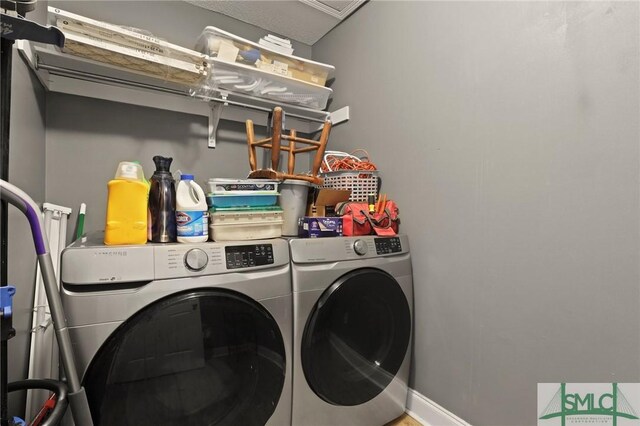 2431 Walden Way, Statesboro, GA 30458 - laundry room with washing machine and dryer and baseboards