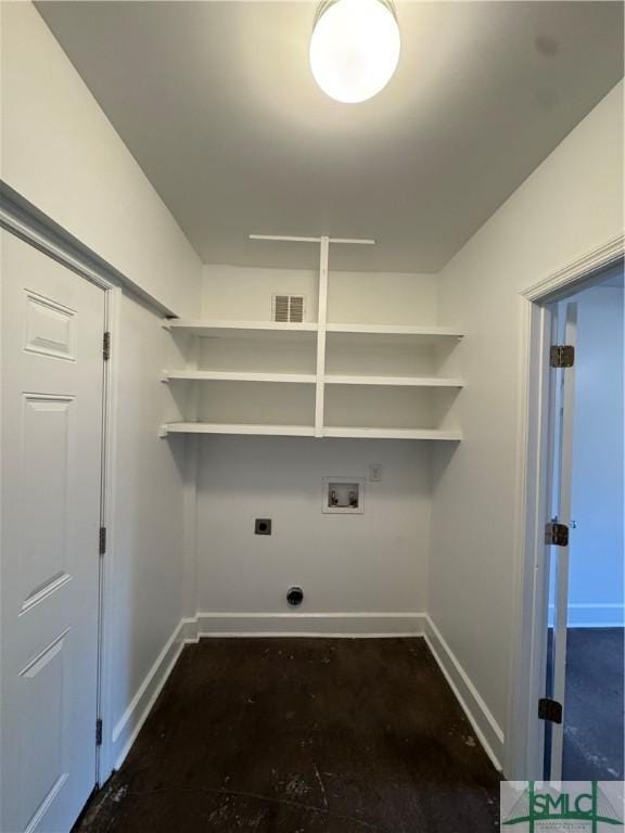 1305 E Anderson St, Savannah, GA 31404 - laundry room with hookup for an electric dryer, baseboards, and hookup for a washing machine