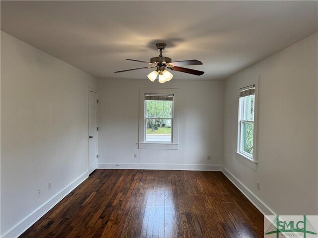 1305 E Anderson St, Savannah, GA 31404 - spare room with dark wood-style flooring, baseboards, and a ceiling fan