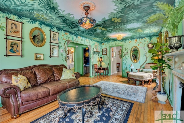 239 Chatham Ave, Pooler, GA 31322 - living room featuring arched walkways, wood finished floors, and wallpapered walls