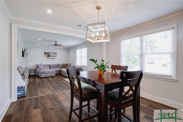 dining room featuring dark wood finished floors, baseboards, a ceiling fan, ornamental molding, and recessed lighting
