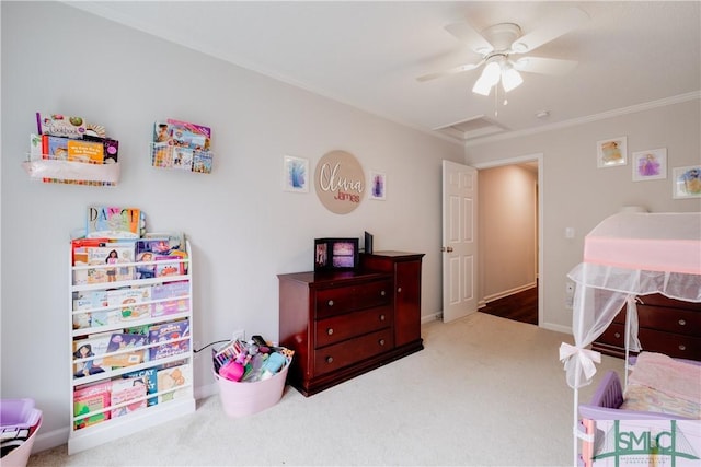 bedroom featuring carpet floors, crown molding, ceiling fan, and baseboards