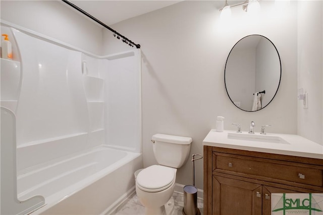 bathroom with toilet, vanity, baseboards, bathtub / shower combination, and marble finish floors