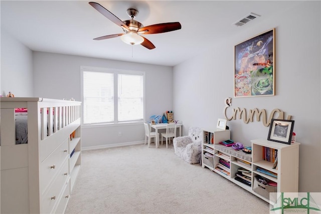 bedroom featuring carpet floors, baseboards, and ceiling fan