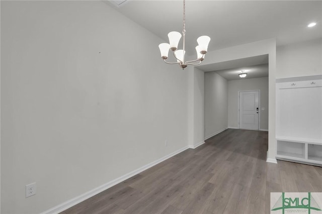 124 Benelli Dr, Pooler, GA 31322 - unfurnished dining area featuring wood finished floors, a chandelier, and baseboards