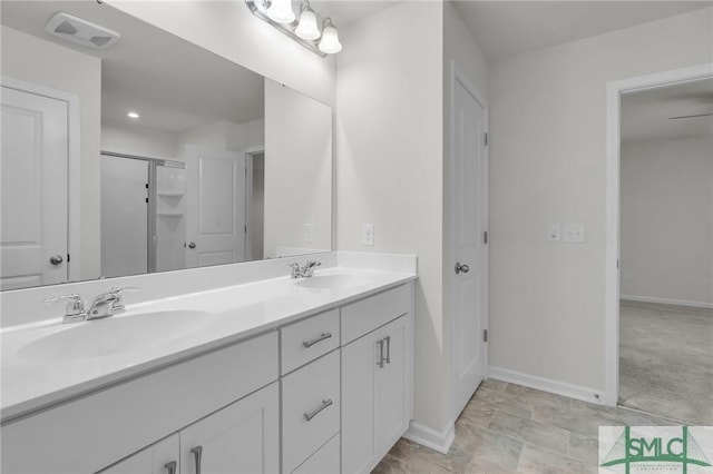 124 Benelli Dr, Pooler, GA 31322 - bathroom with baseboards, double vanity, and a shower with shower door