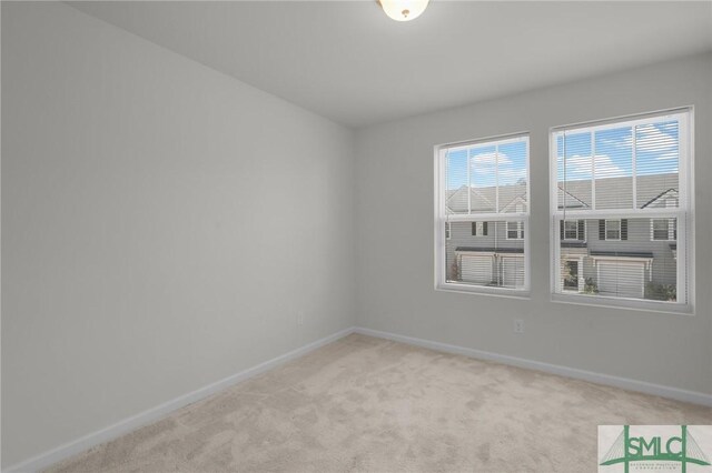 124 Benelli Dr, Pooler, GA 31322 - spare room featuring baseboards and light carpet