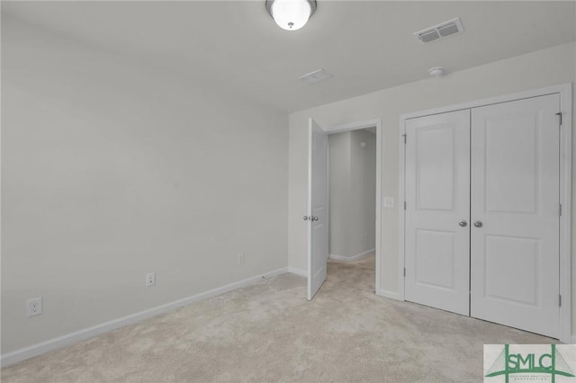 124 Benelli Dr, Pooler, GA 31322 - unfurnished bedroom featuring light colored carpet, baseboards, and a closet