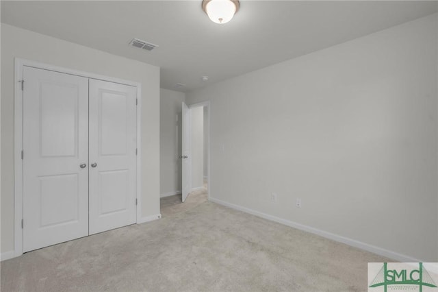124 Benelli Dr, Pooler, GA 31322 - unfurnished bedroom with carpet flooring, baseboards, and a closet