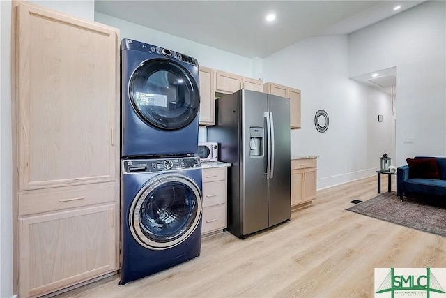 528 E Gordon Ln, Savannah, GA 31401 - laundry area featuring stacked washer / dryer, attic access, light wood-type flooring, baseboards, and recessed lighting