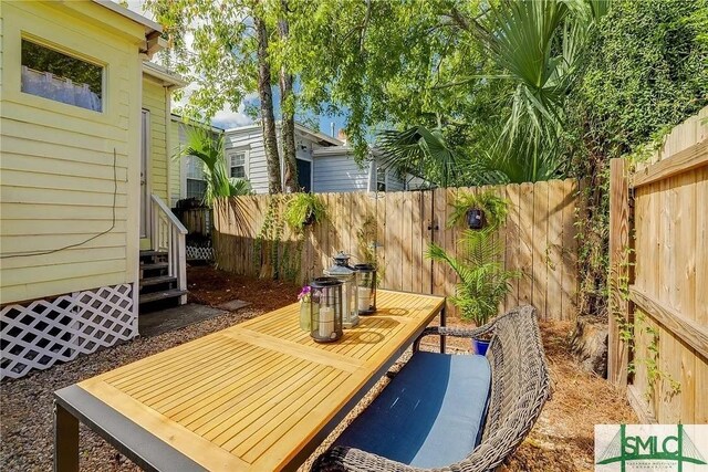 528 E Gordon Ln, Savannah, GA 31401 - view of patio / terrace featuring a fenced backyard and entry steps