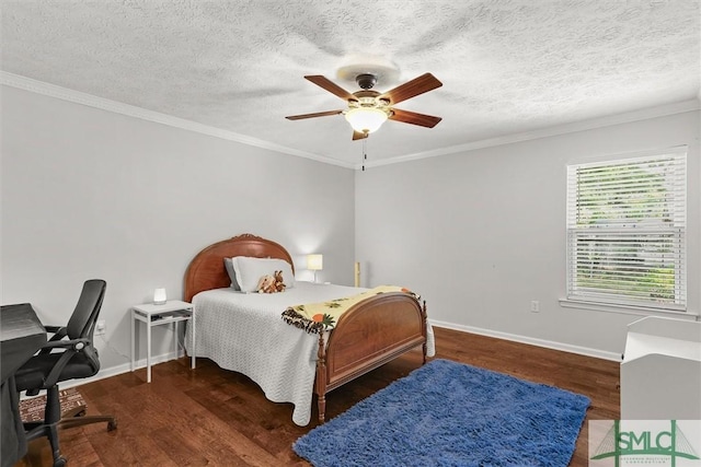 bedroom featuring wood finished floors, crown molding, baseboards, a textured ceiling, and ceiling fan