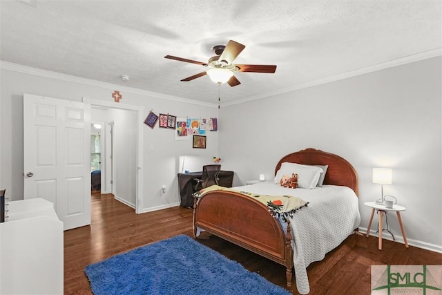 bedroom featuring baseboards, wood finished floors, ceiling fan, ornamental molding, and a textured ceiling