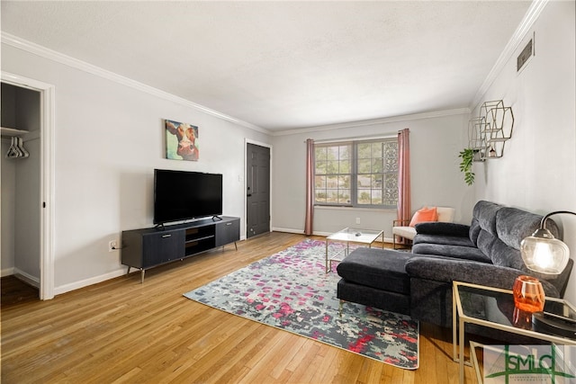 21 Berkley Pl, Savannah, GA 31405 - living area with wood finished floors, crown molding, and baseboards