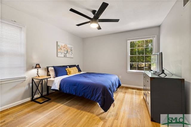 21 Berkley Pl, Savannah, GA 31405 - bedroom featuring light wood-style flooring, baseboards, and ceiling fan