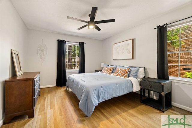 21 Berkley Pl, Savannah, GA 31405 - bedroom featuring light wood finished floors, baseboards, and a ceiling fan