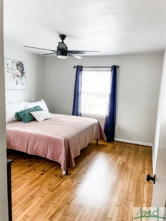 21 Berkley Pl, Savannah, GA 31405 - bedroom featuring hardwood / wood-style flooring and a ceiling fan