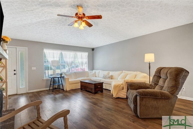 11 Pelican Ct, Richmond Hill, GA 31324 - living area featuring wood-type flooring, a textured ceiling, ceiling fan, and baseboards