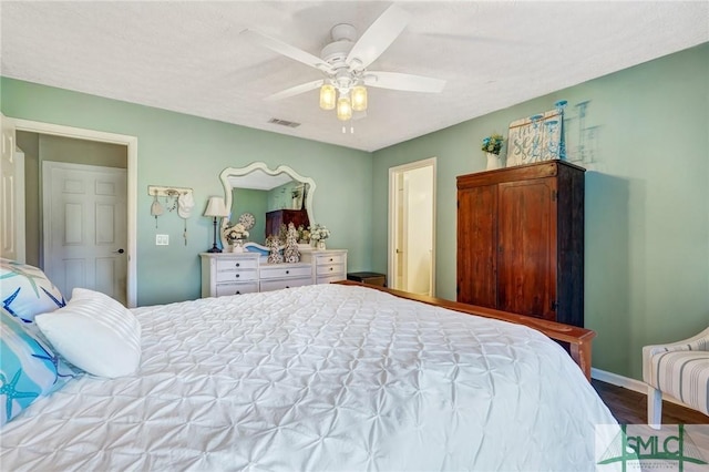 11 Pelican Ct, Richmond Hill, GA 31324 - bedroom featuring wood finished floors, a ceiling fan, and baseboards