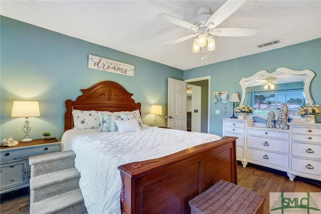11 Pelican Ct, Richmond Hill, GA 31324 - bedroom featuring dark wood-type flooring and ceiling fan