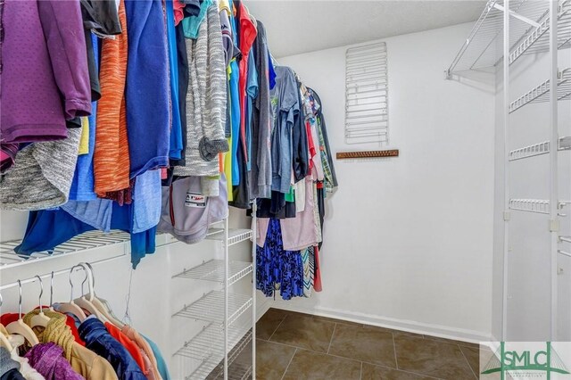 11 Pelican Ct, Richmond Hill, GA 31324 - walk in closet featuring tile patterned floors