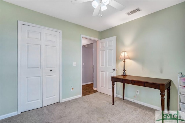 11 Pelican Ct, Richmond Hill, GA 31324 - home office with ceiling fan, carpet floors, and baseboards
